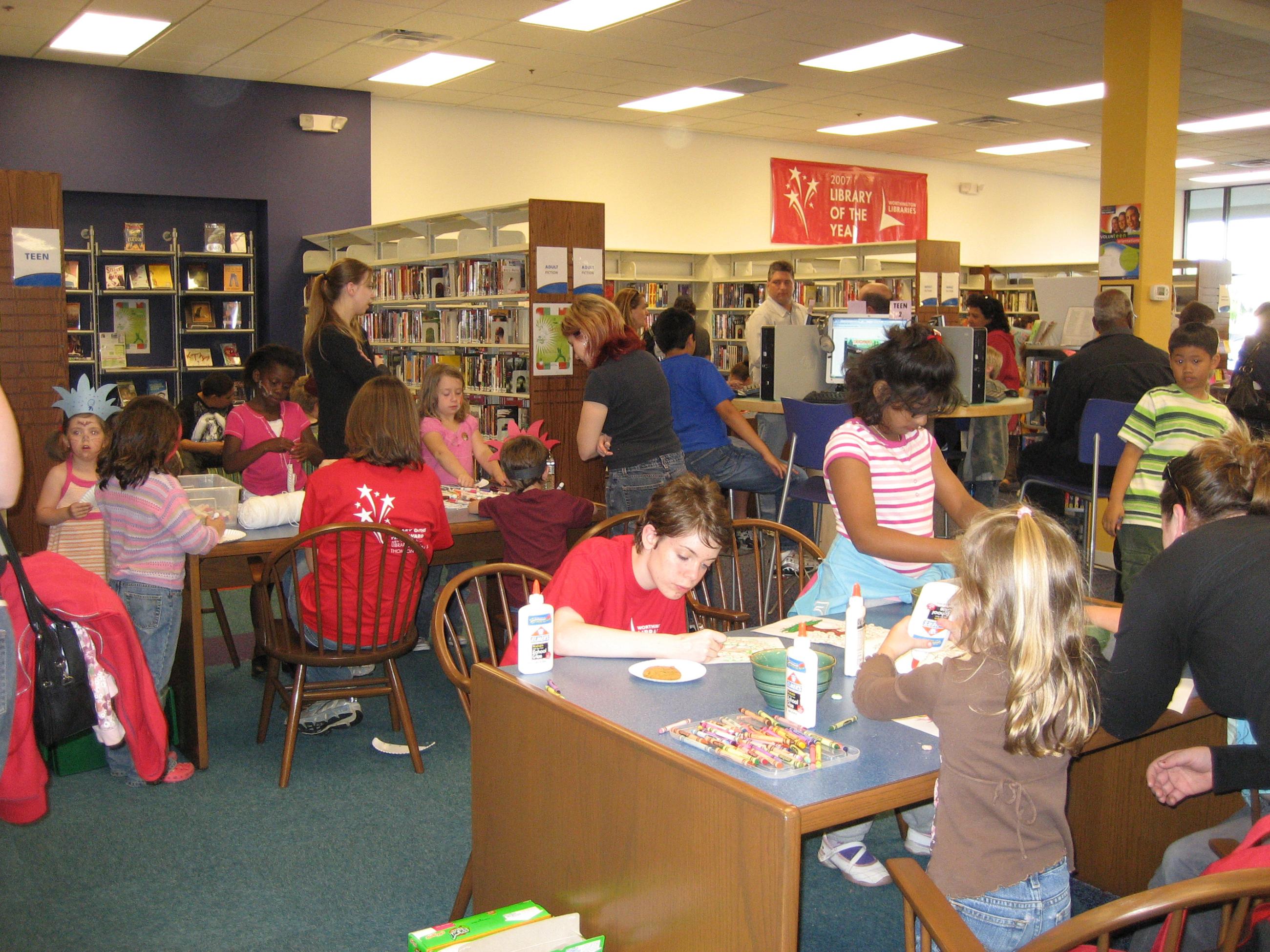 Photograph of Attendees Making Crafts at the Worthington Park Library Family Fun Night