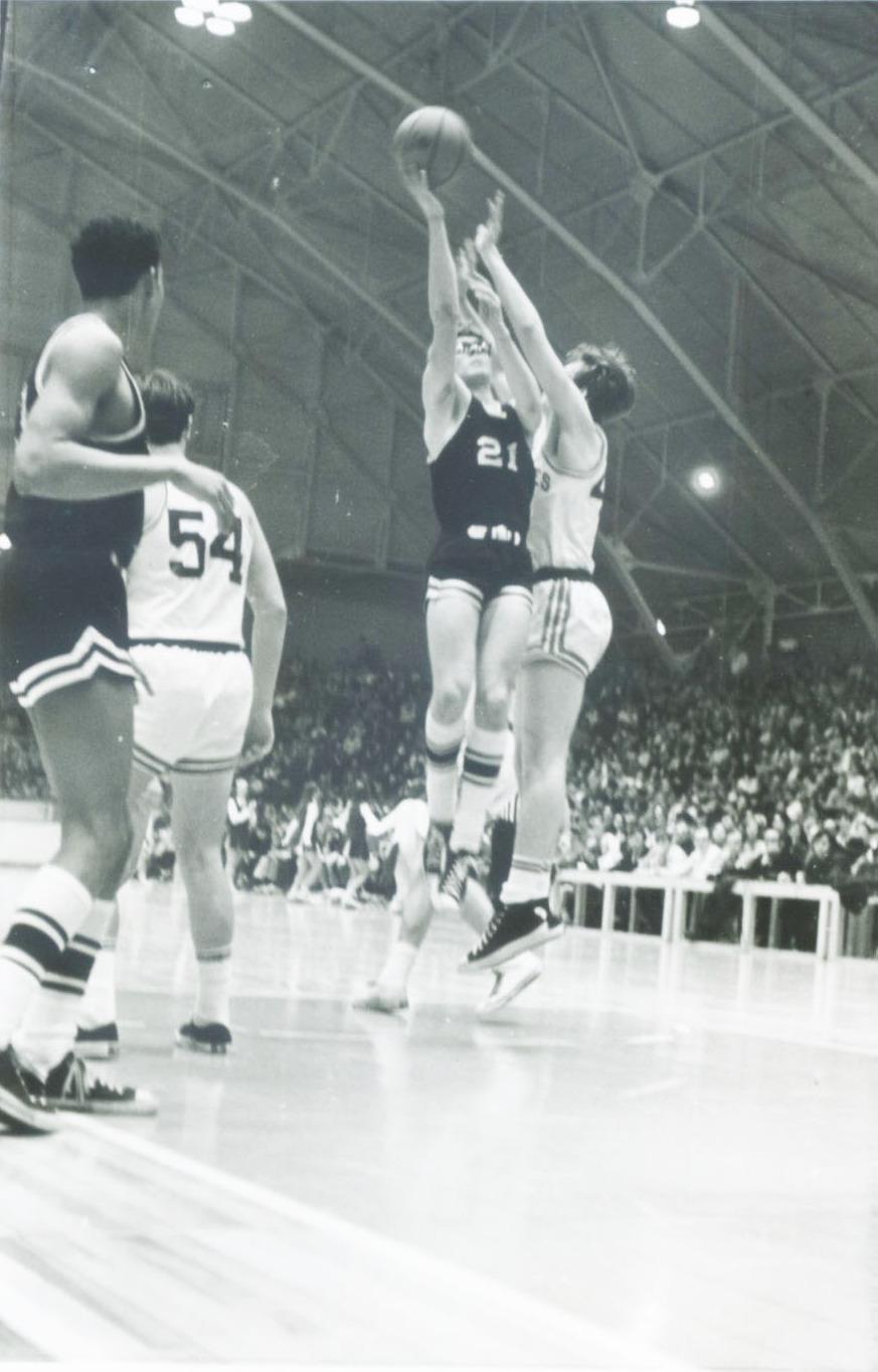Photograph of John Snouffer and Julian Goode Playing Basketball for Worthington High School, 1970