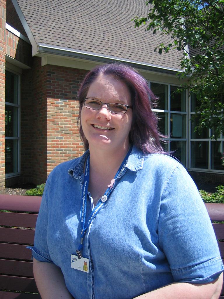 Photograph of Librarian Ann Pechacek with Purple Hair