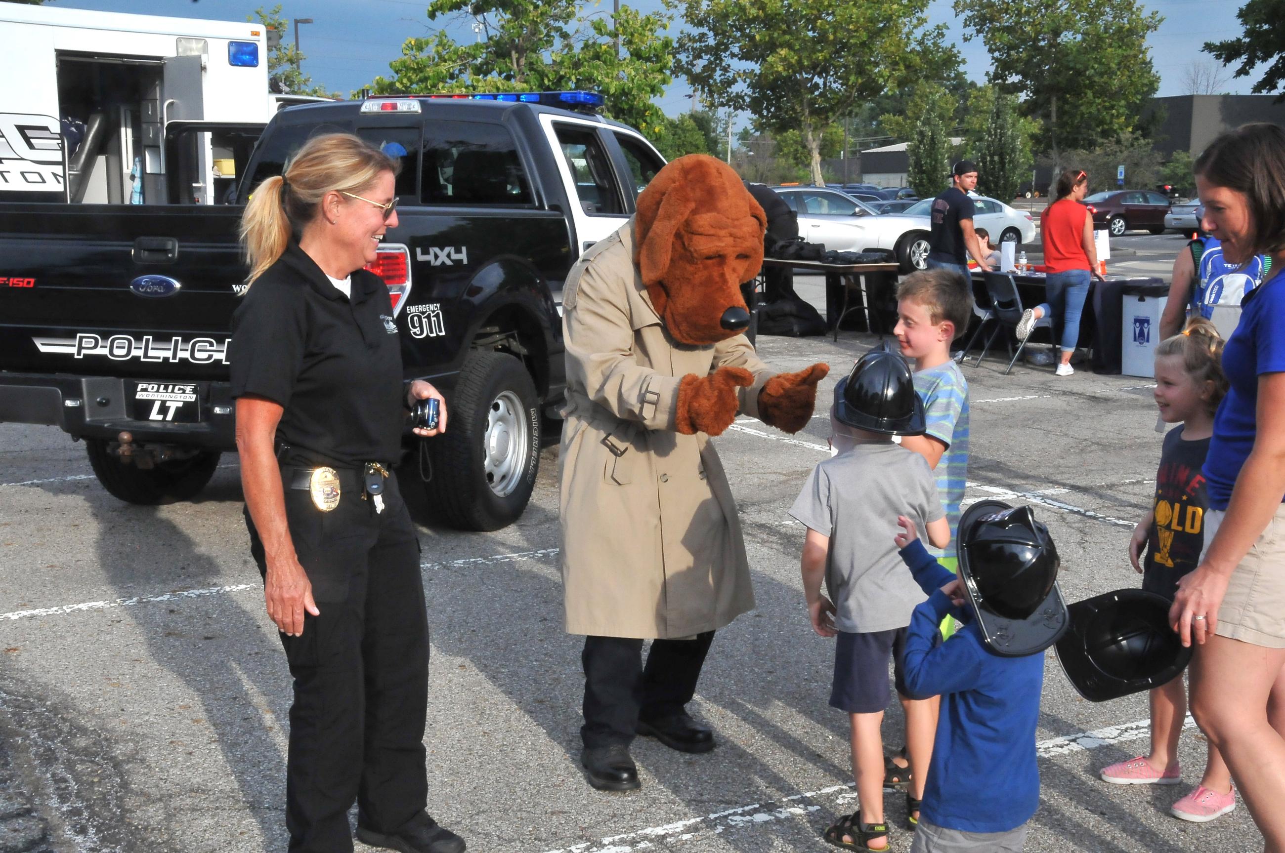 Photograph of Lieutenant Jennifer Wuertz with McGruff the Crime Dog