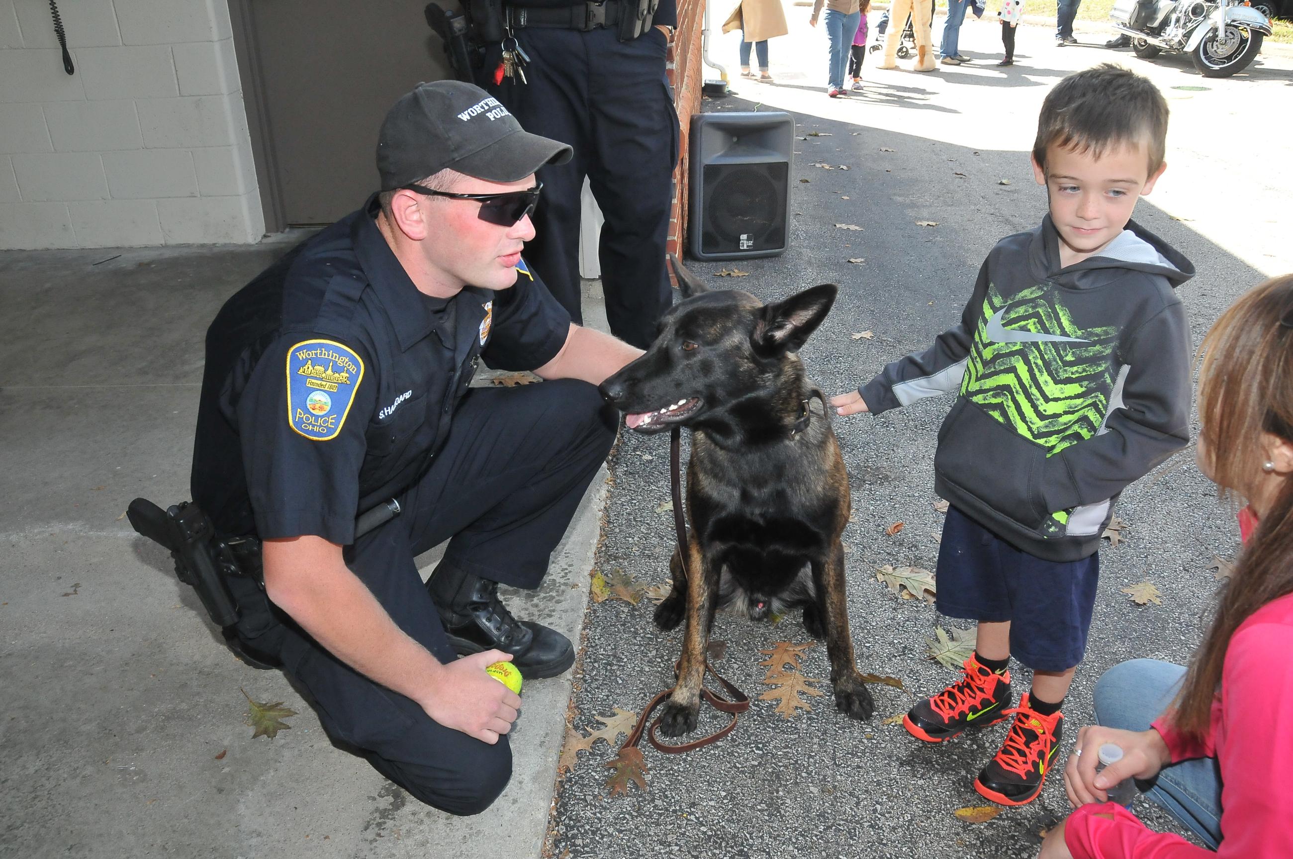 Photograph of Reserve Officer Sean Haggard and Shadow the police dog