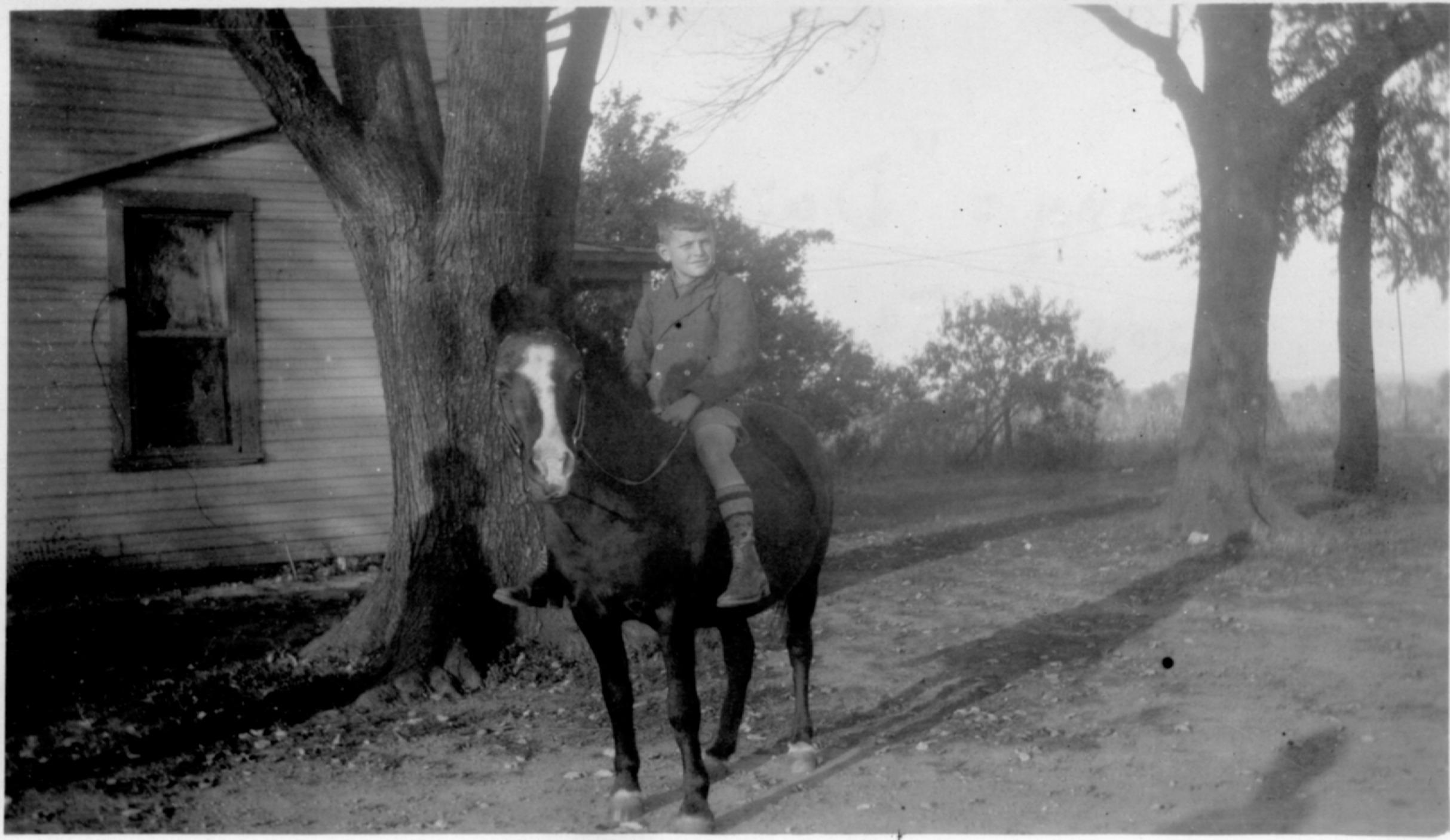 Photograph of Stanley Converse on Daisy the Pony
