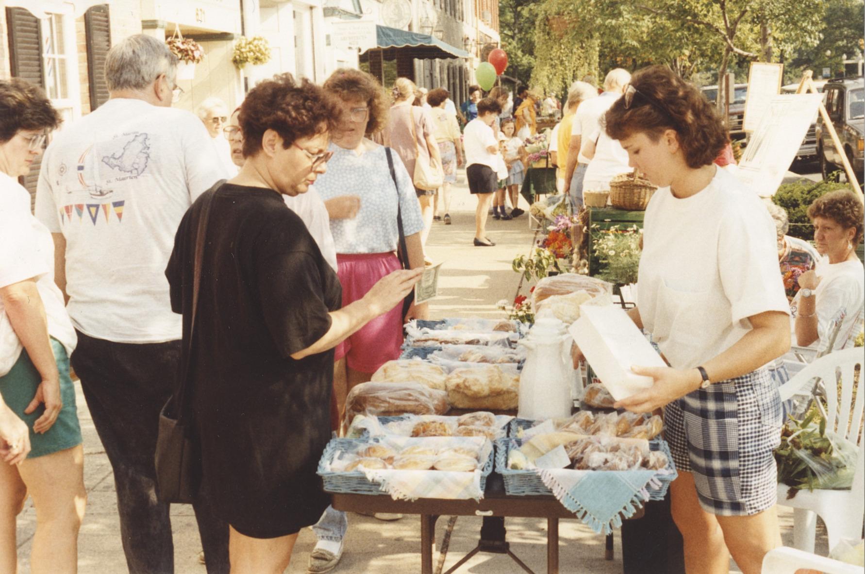 Shoppers Viewing Pastries for Sale at the Worthington Farmer's Market