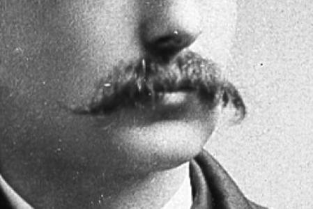 Black and white photo of Eugene Moses Maynard with focus on moustache