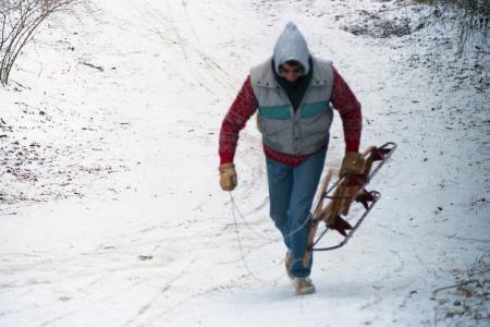 Andy Shirk Walking Up "Devil's Hill" Sled Run