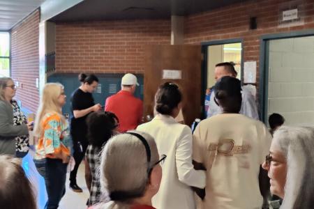 Attendees at the Thomas Worthington High School Alumni Tour, Gathered in Front of a Room