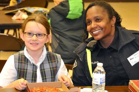 Community Resource Officer Tammy Floyd and Student at St. Michael School