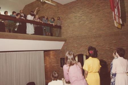 Photograph of Bouquet Toss at Wedding in the Old Worthington Library, May 8, 1982