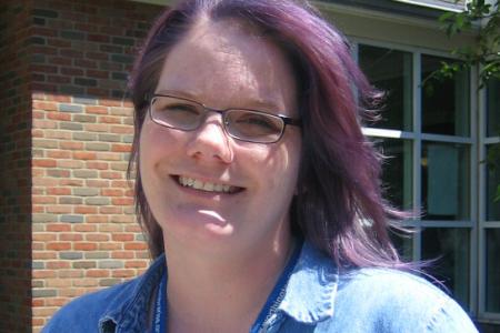 Photograph of Librarian Ann Pechacek with Purple Hair