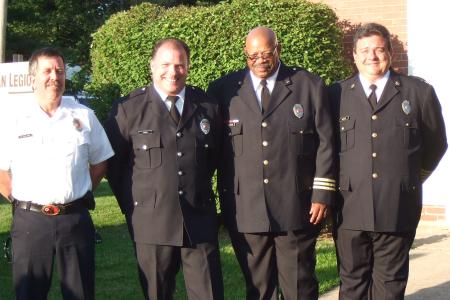 Photograph of Patrick Mulligan, Ron Davis, Bill Fields and Scott Highley at the 2010 Firefighter of the Year Ceremony