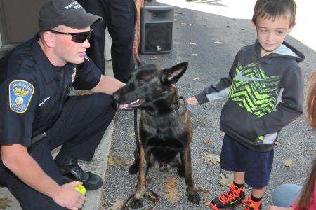 Photograph of Reserve Officer Sean Haggard and Shadow the police dog