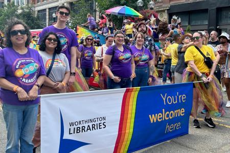 Worthington Libraries Marchers with Banner in the 2023 Stonewall Columbus Pride March