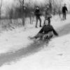 Child Sledding Down "Devil's Hill" Sled Run