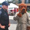 Photograph of Officer Kirk Allton with McGruff the Crime Dog