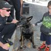 Photograph of Reserve Officer Sean Haggard and Shadow the police dog