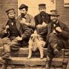 Sepia Photograph of Four Men and Dog