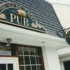 The Old Bag of Nails Pub Storefront and Sign
