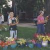 Vendors with Buckets of Flowers at the Worthington Farmer's Market
